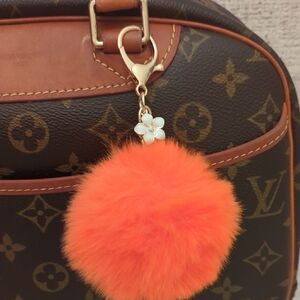 White Flower, Orange Pom  Gold Keychain